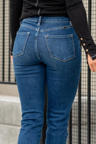 KanCan Jeans  With a high waist and straight fit, these will be your go-to jeans that will never go out of style. Color: Dark Blue  Cut: Straight Fit, 28.5" Inseam* Rise: High-Rise, 11" Front Rise* COTTON 75%, TENCEL 23%,SPANDEX 2% Fly: Zipper Style #: KC11252D Contact us for any additional measurements or sizing.   *Measured on the smallest size, measurements may vary by size.  Sarah wears a size 25 in jeans, a small in tops, and 8 in shoes. She is wearing size 25 in these jeans. 