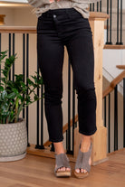 VERVET by Flying Monkey Jeans  Meet our High Rise Cropped Slim Straight Jean with Crossover Waistband Detail – a unique blend of comfort and style. Designed with comfort stretch denim, these jeans feature a high-rise waist that flatters your figure. The crossover waistband detail adds a distinctive touch, setting these jeans apart. The cropped length and slim straight fit make them a versatile choice for various occasions. Upgrade your denim collection with this chic and trendy pair.