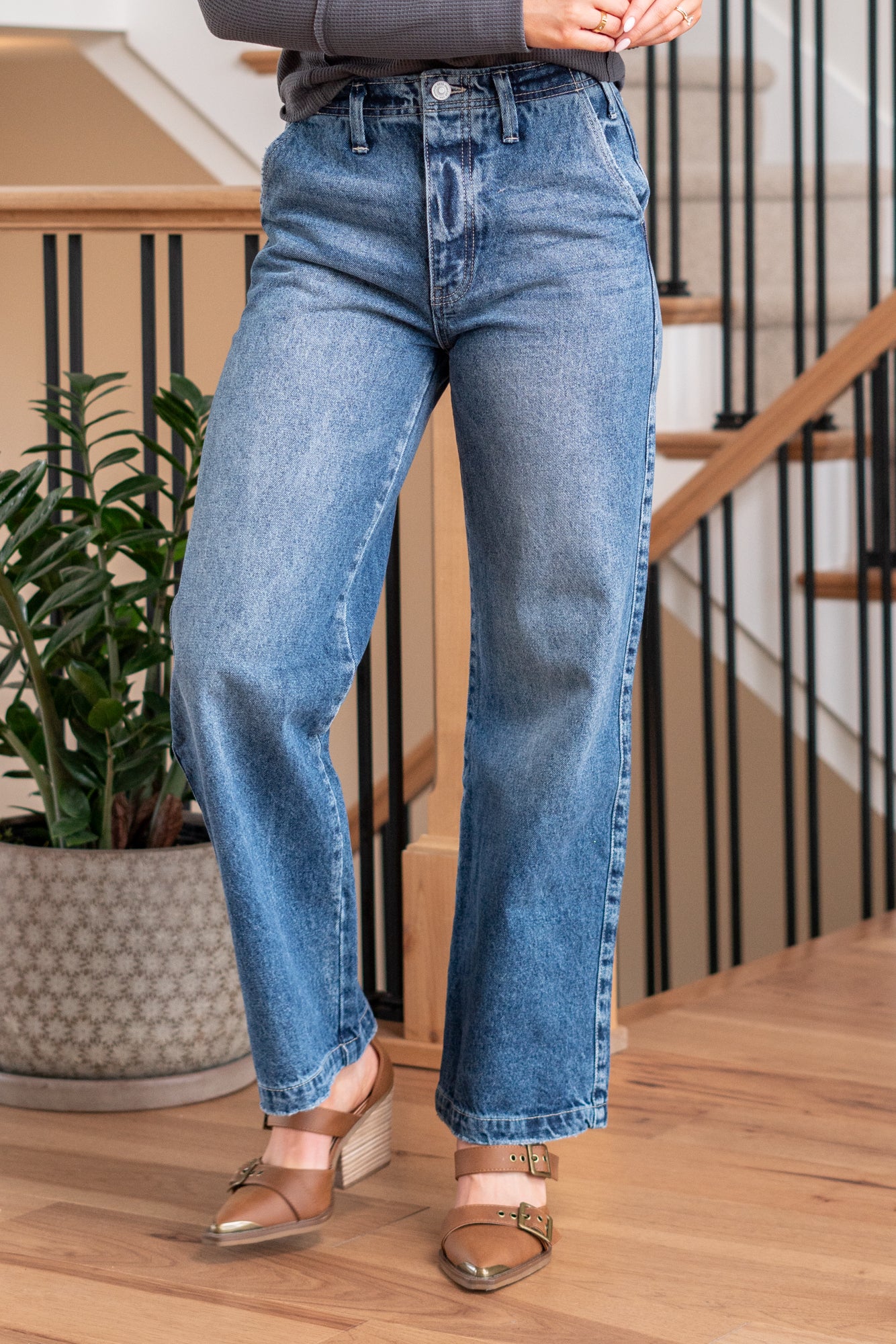 KanCan Jeans   Ultra High Rise 90s Wide Leg Jeans, a nod to the iconic '90s style. While they feature a rigid stretchiness level, these jeans offer a unique design with a hidden button fly, a dart on the back waist, and front slant pockets. The one-inch wide hem adds a trendy twist to complete the look. Color: Dark Wash Cut: FIT, 30" Inseam* Rise:-Rise, 11 1/2" Front Rise* Material: 100% Cotton, Rigid Stitching: Classic Fly: Button Fly Style #: KC7948D