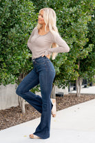 Judy Blue  Don't be afraid to wear high-waisted jeans, especially these flares. With a dark blue wash and a cut hem detail, these will be your favorite denim to dress up. Color: Dark Blue Wash Cut: Flare, 34" Inseam* Rise: High-Rise. 10.75" Front Rise* Material: 52% Cotton / 23% Polyester / 22% Rayon / 3% Spandex Stitching: Classic  Fly: Zipper Style #: JB82343 | 82343 *Measured on the smallest size, measurements may vary by size.  Contact us for any additional measurements or sizing.