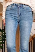 KanCan Jeans   Introducing the Iris High Rise Crop Boot Cut jeans, a perfect blend of modern trends and timeless comfort. These jeans feature a flattering high rise and a stylish crop bootcut leg, creating a chic and versatile silhouette. The medium wash adds a touch of classic appeal, while the stretch fabric ensures comfort for all-day wear.