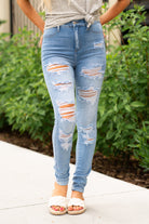 Cello Jeans Look and feel incredible in this stylish, yet versatile High Rise Distressed Skinny jeans. Additionally equipped with five pockets, belt loops and a zip fly closure. Collection: Spring 2021 Distressed Skinny Color: Light Blue Wash  Cut: Skinny, 29" Inseam Rise: High-Rise, 11" Front Rise 41% Cotton 42% Rayon 9% Lyocell 6% Polyester 2% Spandex Fly: Zipper  Style #: WV17551LTD Contact us for any additional measurements or sizing.