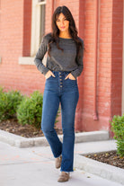 KanCan Jeans  KanCan Comfort Stretch Color: Dark Blue Cut: Boot Cut, 32" Inseam* Rise: High-Rise, 11" Front Rise* COTTON 94% POLYESTER 4% SPANDEX 2% Stitching: Classic  Fly: Zipper Style #: KC7138D Contact us for any additional measurements or sizing.  *Measured on the smallest size, measurements may vary by size.