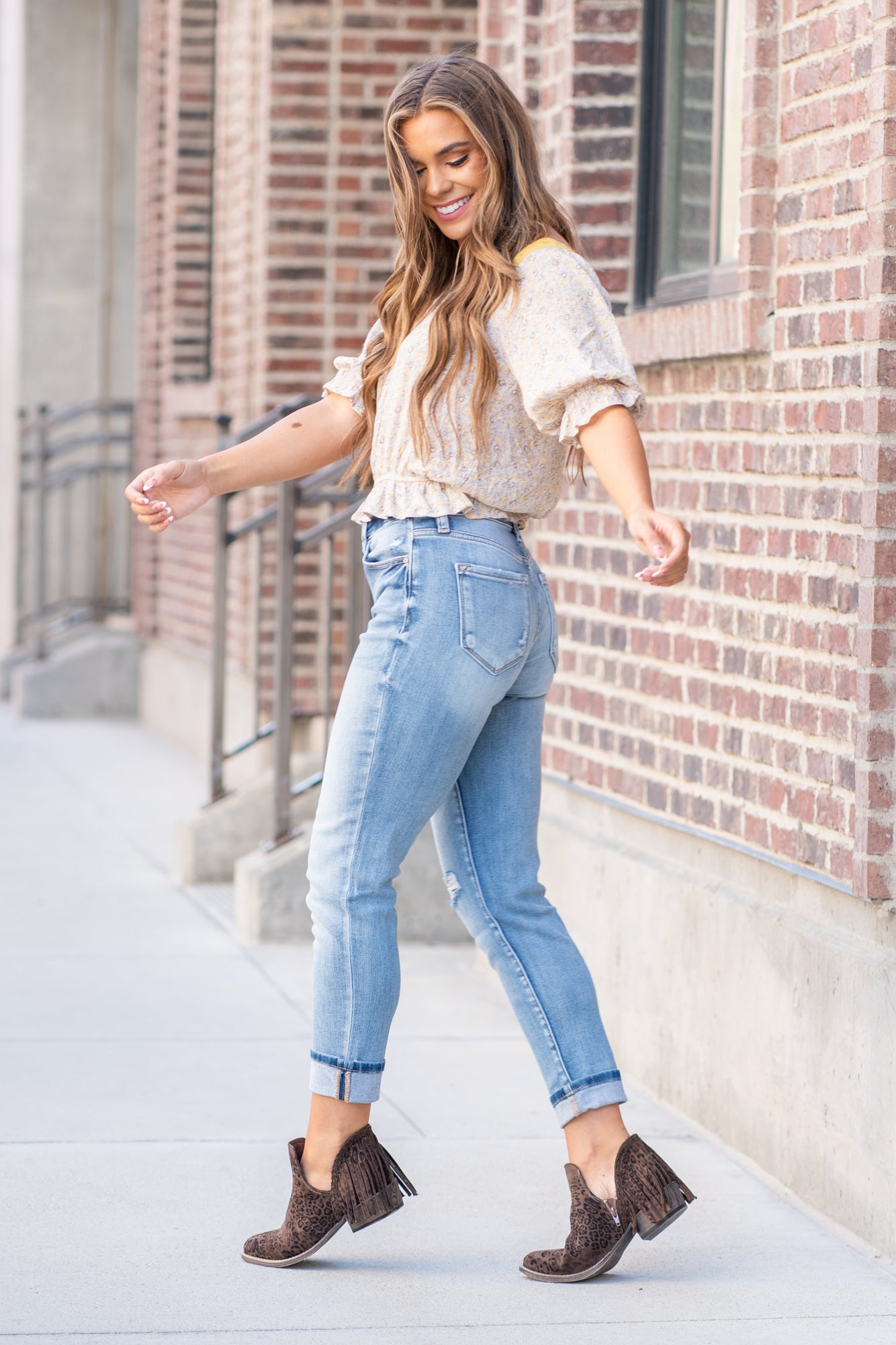 KanCan Jeans  These mom jeans will become your go-to! Pair these girlfriend mom fit with booties and a tee for an easy fall look.  Color: Medium Blue Wash Cut: Straight Fit, 26" Inseam Cuffed* Rise: High-Rise, 11" Front Rise* 94% COTTON , 5% POLYESTER , 1% SPANDEX Fly: Zipper Style #: KC9232M Contact us for any additional measurements or sizing.