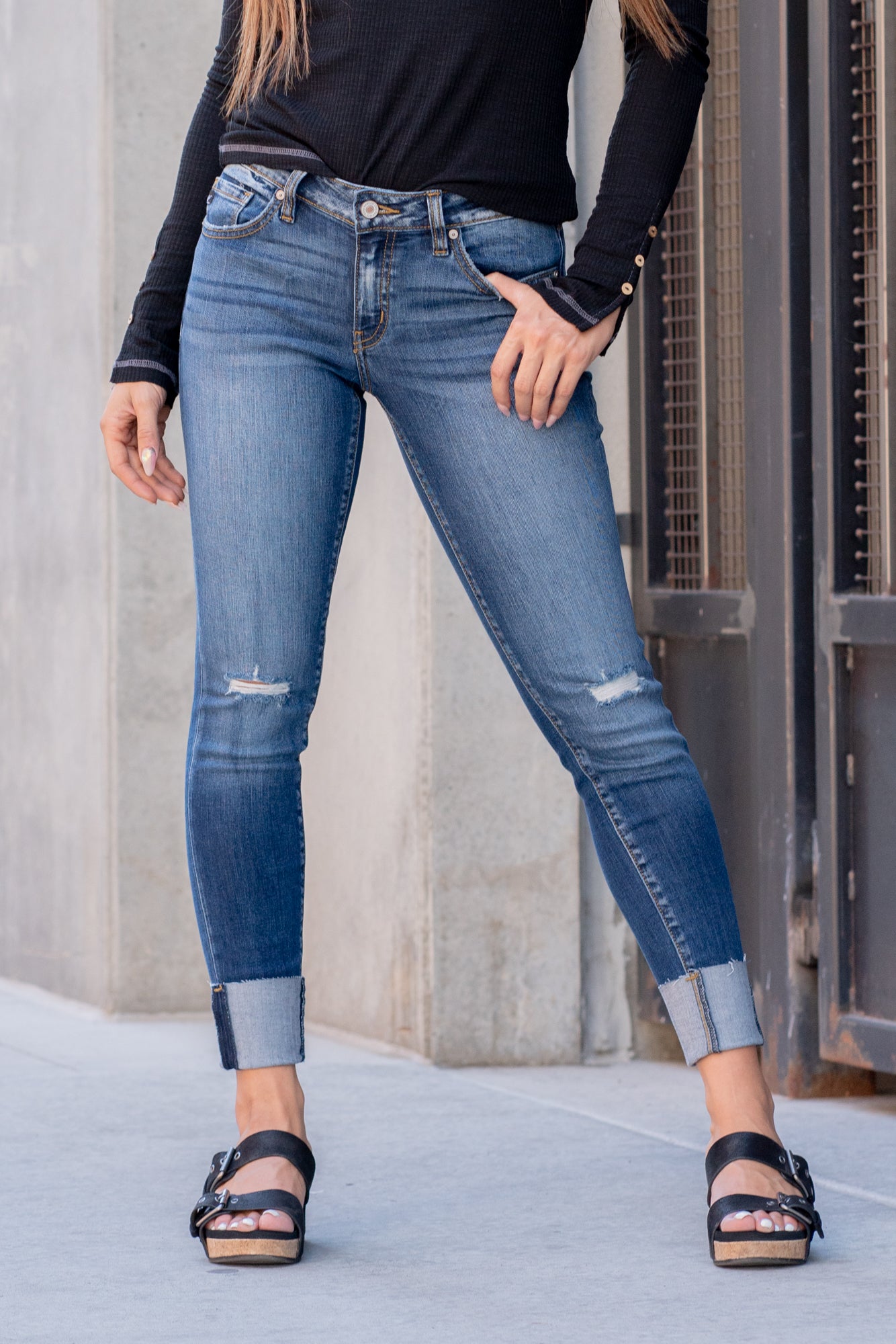 KanCan Jeans Color: Dark Blue Cut: Skinny, 27" Inseam Rise: Low-Rise, 8" Front Rise 73% COTTON, 14 % RAYON, 11% POLYESTER, 2% SPANDEX Stitching: Classic Fly: Zipper Style #: KC8245D Contact us for any additional measurements or sizing.    *Measured on the smallest size, measurements may vary by size.   Alyssa wears a size 25 in jeans, a small in tops, and 8 in shoes. She is wearing size 3 in these jeans. 