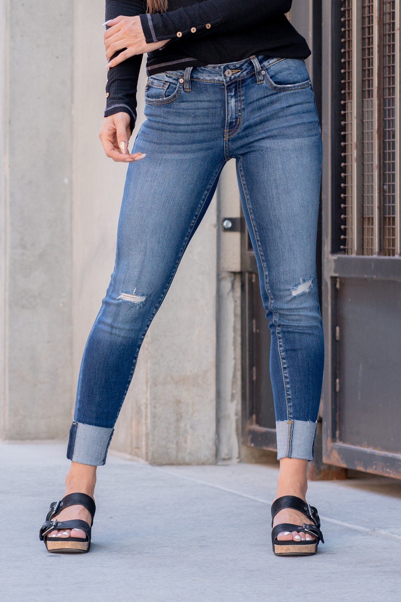 KanCan Jeans Color: Dark Blue Cut: Skinny, 27" Inseam Rise: Low-Rise, 8" Front Rise 73% COTTON, 14 % RAYON, 11% POLYESTER, 2% SPANDEX Stitching: Classic Fly: Zipper Style #: KC8245D Contact us for any additional measurements or sizing.    *Measured on the smallest size, measurements may vary by size.   Alyssa wears a size 25 in jeans, a small in tops, and 8 in shoes. She is wearing size 3 in these jeans. 