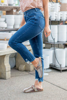 KanCan Jeans  With a high waist and straight fit, these will be your go-to jeans that will never go out of style. Color: Dark Blue  Cut: Straight Fit, 28.5" Inseam* Rise: High-Rise, 10.75" Front Rise* 95% COTTON , 4% POLYESTER , 1% SPANDEX Fly: Zipper Style #: KC5217TD Contact us for any additional measurements or sizing.   *Measured on the smallest size, measurements may vary by size.  Alyssa wears a size 25 in jeans, a small in tops, and 8 in shoes. She is wearing size 3 in these jeans. 