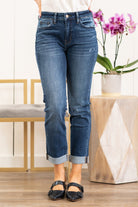 Flying Monkey Jeans  A stretchy denim with a slouchy relaxed fit make these boyfriend jeans comfortable for everyday wear. Collection: Winter 2021 Name: Poison  Cut: Boyfriend Fit, 27" Inseam Rise: High Rise, 10.25" Front Rise 99% COTTON, 1% SPANDEX Stitching: Classic Style #: Y3975 Contact us for any additional measurements or sizing.  Chloe is 5’8" and 130 pounds. She wears a size 3 in jeans, a small top and 8.5 in shoes. She is wearing a 26/3 in these jeans.