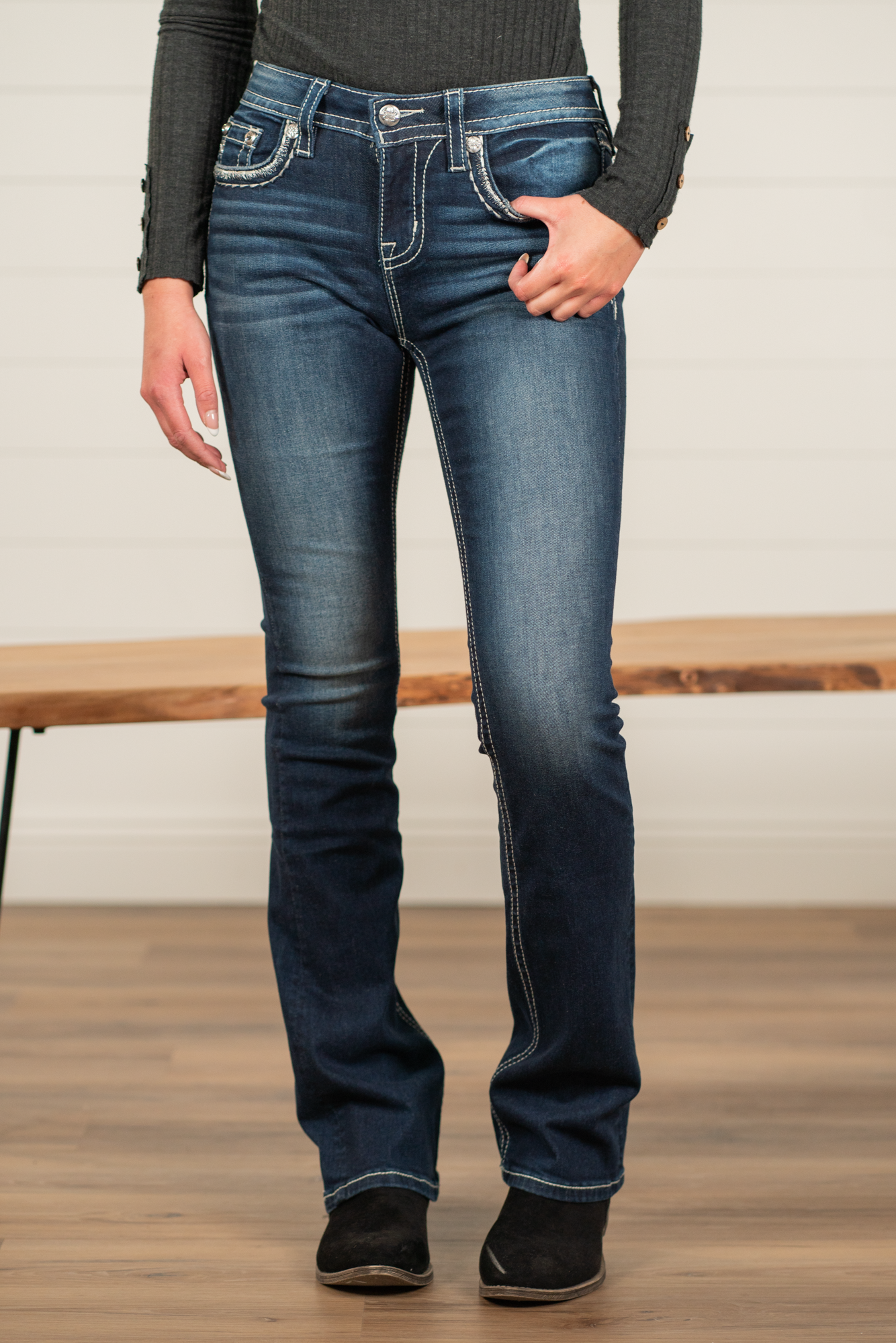 Miss Me  Wear these leopard cactus embellished pocket jeans every day to bling up your wardrobe. Slim boot cut jeans featuring a 5 pocket design, whiskering, and crystal rivets. Wash: Dark Blue Inseam: 34" Slim Boot Cut* Mid Rise, 8.75" Front Rise*