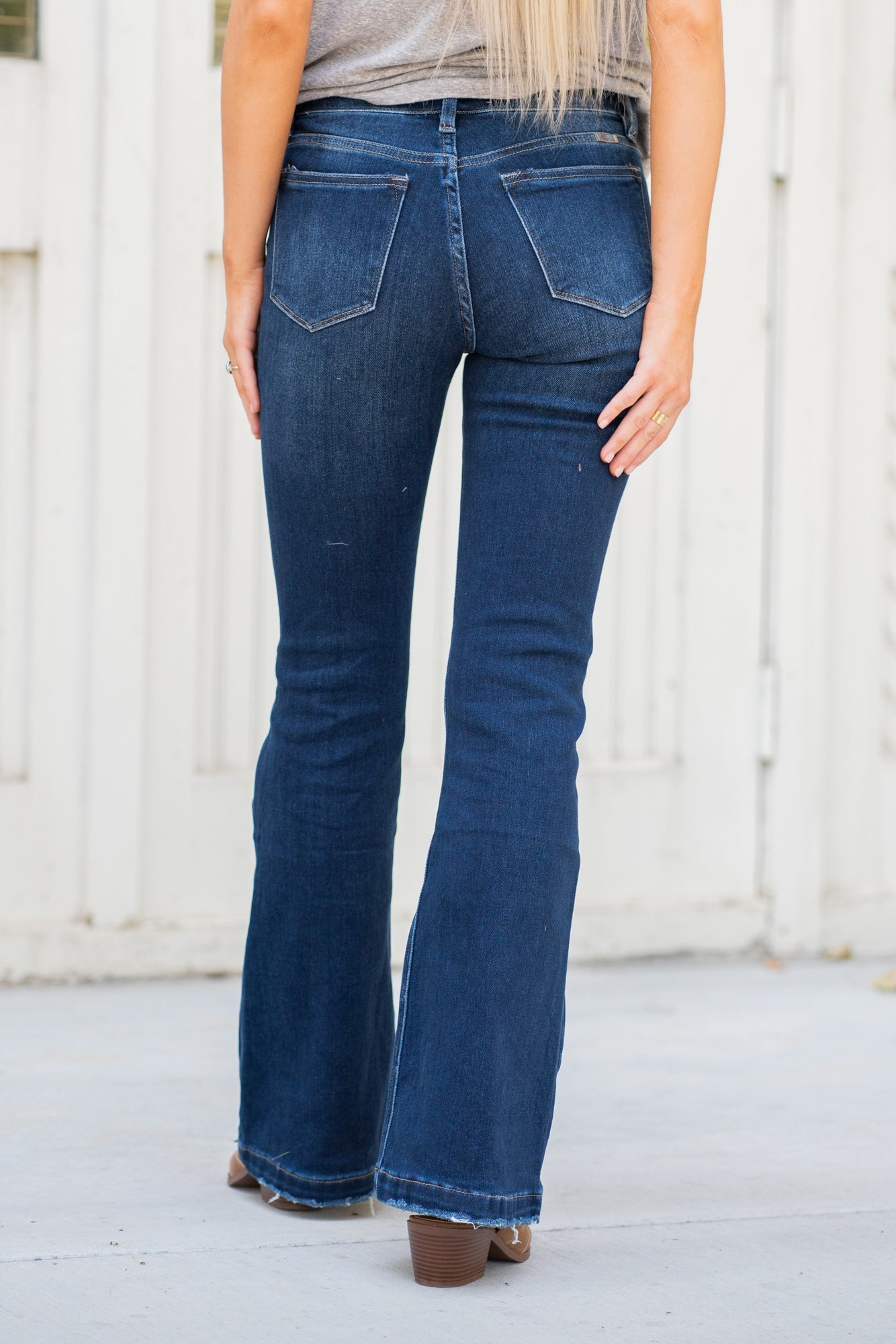 KanCan Jeans  Collection: Core Style  Flare, 32" Inseam  Mid Rise, 8.5" Front Rise Dark Blue Wash  COTTON 94% POLYESTER 5% SPANDEX 1% Fly: Exposed Button Fly Style #: KC6327D-PT Contact us for any additional measurements or sizing.