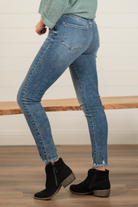 KanCan Jeans  These high-rise blue wash skinny jeans have the classic KanCan exposed button fly. Dress up this denim with a bodysuit or wear them casual with a crop top to accentuate your waistline.   KanCan Stretch Level: Comfort Stretch  Collection: Core Style Color: Dark Wash 94.2% COTTON, 4.7% POLYESTER, 1.1% SPANDEX Cut: Curvy-Fit Skinny, 28" Inseam* Rise: High-Rise, 11" Front Rise* Stitching: Classic Fly: Exposed Button Fly  Style #: BM7273HWM Contact us for any additional measurements or sizing.