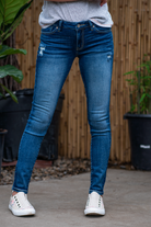 KanCan Jeans Collection: Core Collection  Color: Dark Wash  Cut: Skinny, 29.5" Inseam* Rise: Mid-Rise, 8.5" Front Rise* COTTON 95% POLYESTER 4% SPANDEX 1% Fly: Zipper Style #: KC8561D Contact us for any additional measurements or sizing.   *Measured on the smallest size, measurements may vary by size.