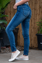 KanCan Jeans Collection: Core Collection  Color: Dark Wash  Cut: Skinny, 29.5" Inseam* Rise: Mid-Rise, 8.5" Front Rise* COTTON 95% POLYESTER 4% SPANDEX 1% Fly: Zipper Style #: KC8561D Contact us for any additional measurements or sizing.   *Measured on the smallest size, measurements may vary by size.