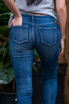 KanCan Jeans Collection: Core Collection  Color: Dark Wash  Cut: Skinny, 29.5" Inseam* Rise: Mid-Rise, 8.5" Front Rise* COTTON 95% POLYESTER 4% SPANDEX 1% Fly: Zipper Style #: KC8561D Contact us for any additional measurements or sizing.   *Measured on the smallest size, measurements may vary by size.