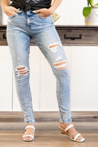 VERVET by Flying Monkey Jeans This comfortable high rise ankle skinny's have a distressed knee & legs. Pair with a graphic tee and sandals this season for a casual look. Collection: Spring 2021 Skinny, 29" Inseam  Ripped Destroyed Hem Legs Rise: High Rise, 10" Front Rise 93% COTTON , 5% POLYESTER , 2% SPANDEX Machine Wash Separately In Cold Water Stitching: Classic Fly: Zipper Style #: T5205 Contact us for any additional measurements or sizing.