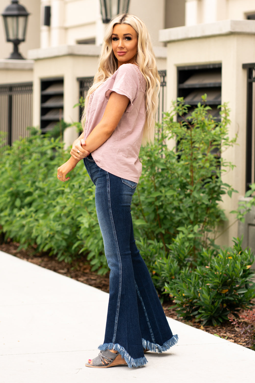 KanCan Jeans  You will love the way these boot cuts fit your curves. Dress up with heels and a cute flutter sleeve top for a night out.  Collection: Spring 2021 Color: Dark Blue Cut: Boot Cut, 32.5" Inseam Rise: High-Rise, 10" Front Rise 94% COTTON, 5% POLYESTER, 1% SPANDEX Stitching: Classic Fly: Zipper Style #: KC5224D Contact us for any additional measurements or sizing.