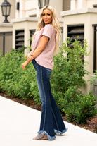 KanCan Jeans  You will love the way these boot cuts fit your curves. Dress up with heels and a cute flutter sleeve top for a night out.  Collection: Spring 2021 Color: Dark Blue Cut: Boot Cut, 32.5" Inseam Rise: High-Rise, 10" Front Rise 94% COTTON, 5% POLYESTER, 1% SPANDEX Stitching: Classic Fly: Zipper Style #: KC5224D Contact us for any additional measurements or sizing.