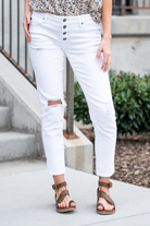 KanCan Jeans  These mom jeans will become your go-to! Pair these girlfriend mom fit with sandals and a tee for an easy summer look.  Color: White Cut: Straight Fit, 27" Inseam  Rise: Mid-Rise, 8.5" Front Rise 100% COTTON Fly: Exposed Button Fly Style #: KC5118WT  Contact us for any additional measurements or sizing.  