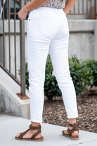 KanCan Jeans  These mom jeans will become your go-to! Pair these girlfriend mom fit with sandals and a tee for an easy summer look.  Color: White Cut: Straight Fit, 27" Inseam  Rise: Mid-Rise, 8.5" Front Rise 100% COTTON Fly: Exposed Button Fly Style #: KC5118WT  Contact us for any additional measurements or sizing.  