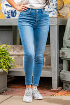 VERVET by Flying Monkey Jeans  Super soft stretchy denim, high rise waist, skinny fitted legs with a light blue wash. Skinny, 27" Inseam* Rise: High Rise, 10" Front Rise* 98% Cotton, 2% Spandex Machine Wash Separately In Cold Water Stitching: Classic  Fly: Zipper    Style #: V2634 Contact us for any additional measurements or sizing.    *Measured on the smallest size, measurements may vary by size. 