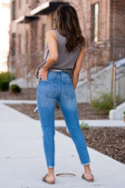 KanCan Jeans These 100% cotton mom jeans will become your go to! With no spandex, these jeans will mold to your body shape and feel amazing. Pair with heels or tennies, you cant go wrong with a high rise straight like these. Collection: Spring 2021 Color: Medium Blue Wash Cut: Straight Fit, 27" Inseam  Rise: High-Rise, 11" Front Rise 100% Cotton Fly: Zipper  Style #: KC7859M  Contact us for additional questions about size or fit.