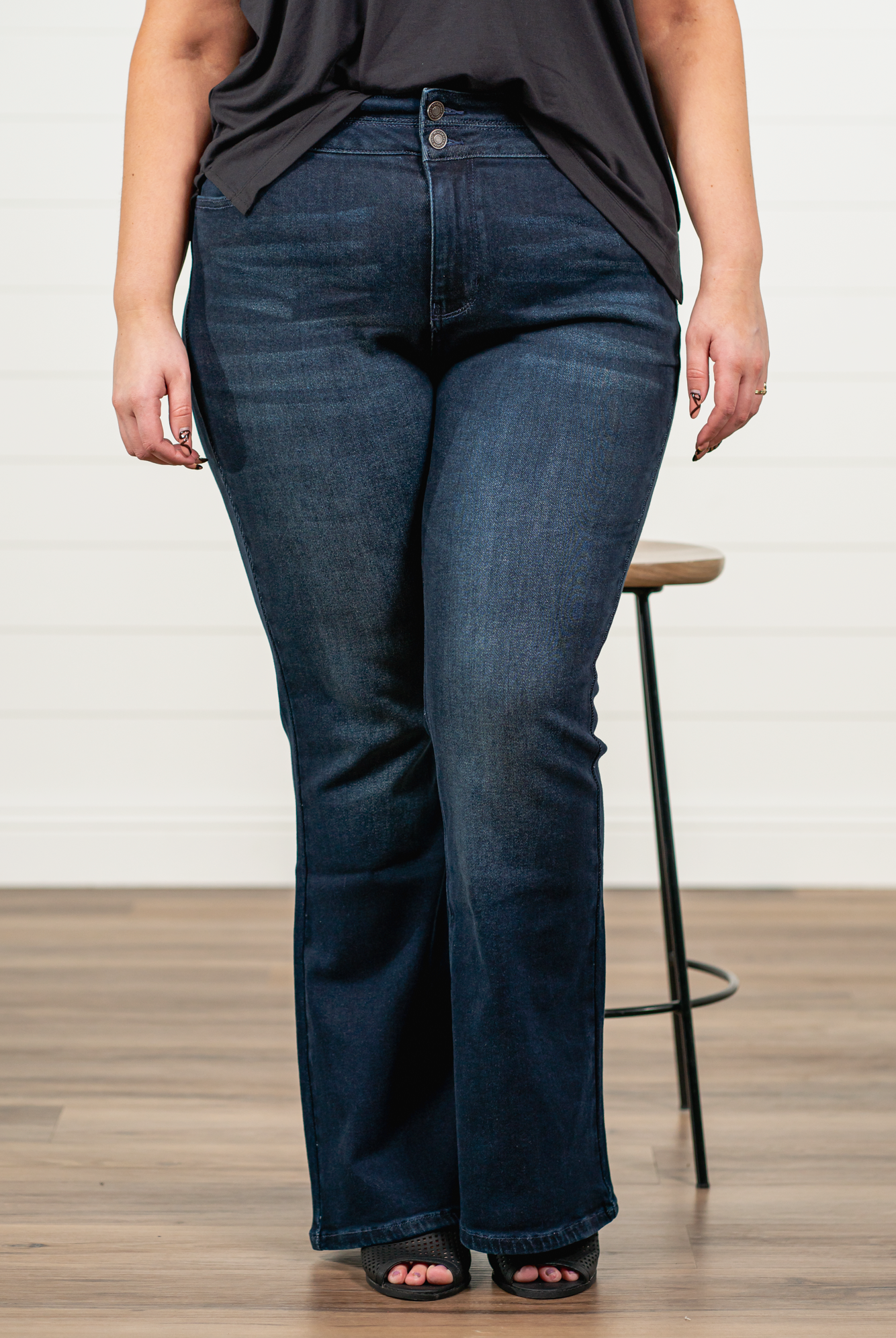 KanCan Jeans   KanCan Plus Size Guide:   XL-16 2XL-18 3XL-20  Color: Dark Wash Cut: Flare Cut, 34" Inseam* Rise: High-Rise, 10.5" Front Rise* Material: 94% Cotton 4% Polyester2% Spandex Detail: Whisker Wash Fly: Zipper Fly with Double Button Closure Style #: KC7123D-P Contact us for any additional measurements or sizing.  *Measured on the smallest size, measurements may vary by size.