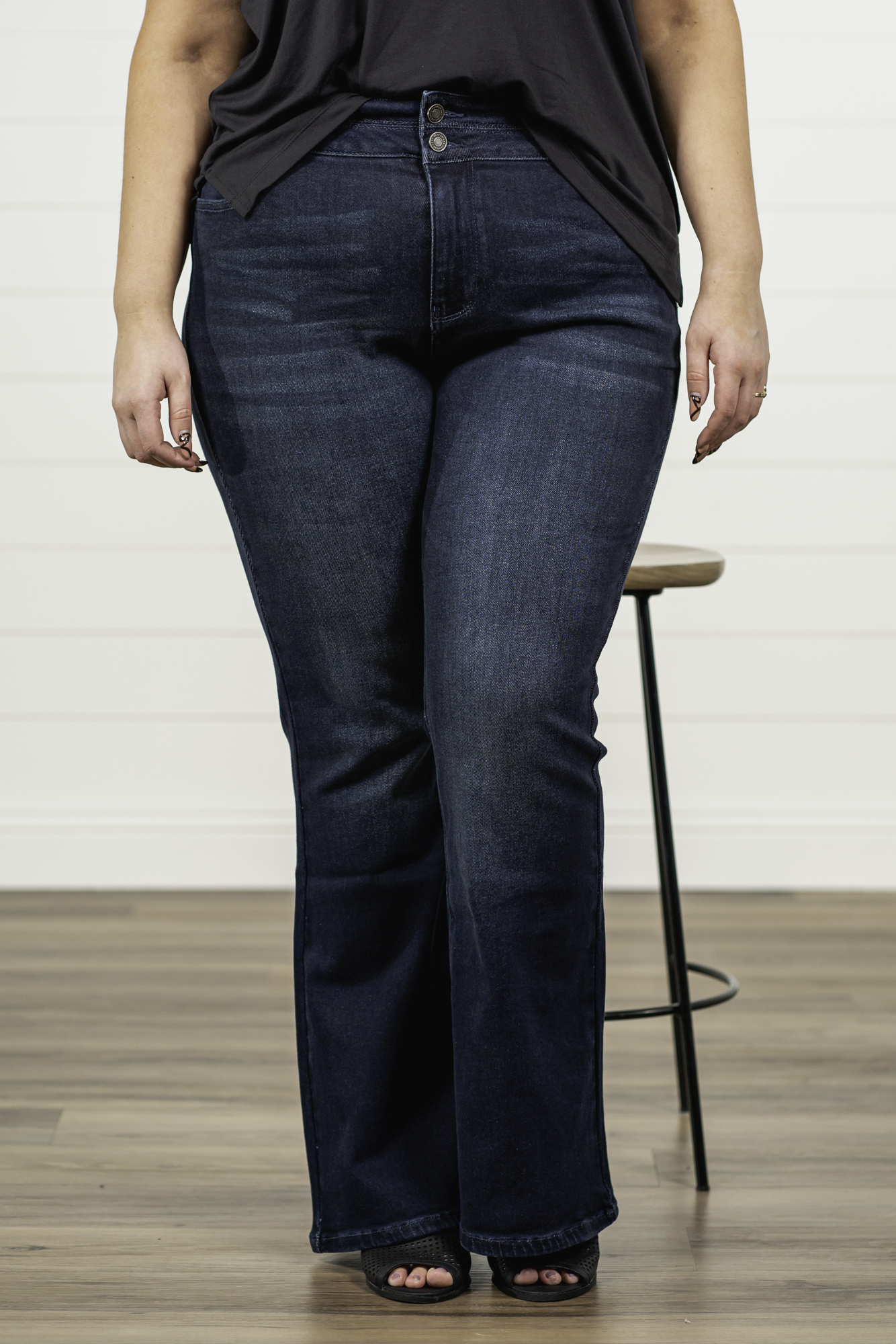 KanCan Jeans   KanCan Plus Size Guide:   XL-16 2XL-18 3XL-20  Color: Dark Wash Cut: Flare Cut, 34" Inseam* Rise: High-Rise, 10.5" Front Rise* Material: 94% Cotton 4% Polyester2% Spandex Detail: Whisker Wash Fly: Zipper Fly with Double Button Closure Style #: KC7123D-P Contact us for any additional measurements or sizing.  *Measured on the smallest size, measurements may vary by size.