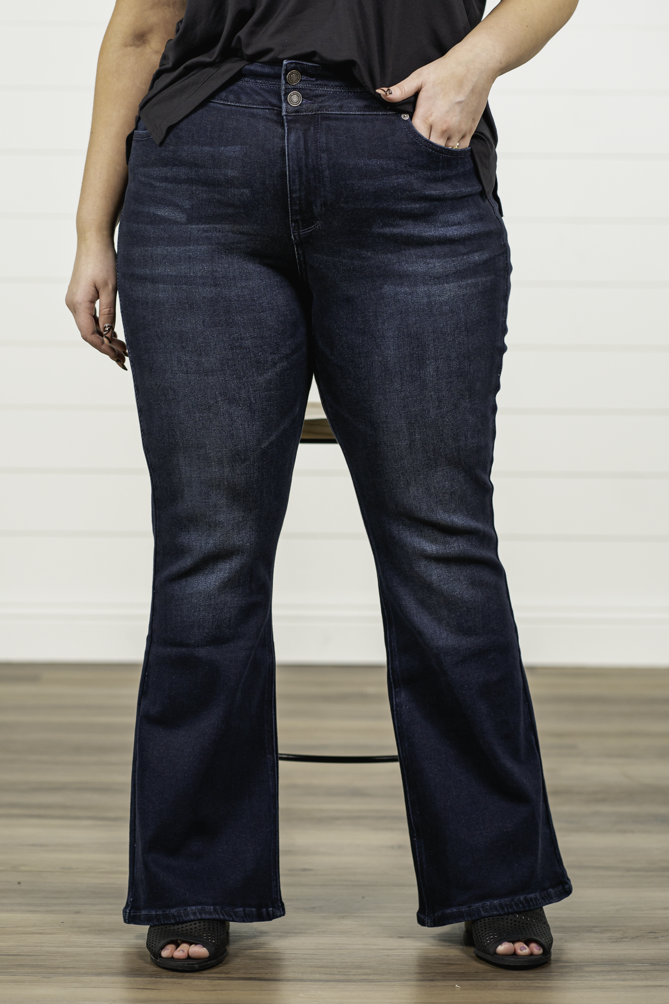 KanCan Jeans   KanCan Plus Size Guide:   XL-16 2XL-18 3XL-20  Color: Dark Wash Cut: Flare Cut, 34" Inseam* Rise: High-Rise, 10.5" Front Rise* Material: 94% Cotton 4% Polyester2% Spandex Detail: Whisker Wash Fly: Zipper Fly with Double Button Closure Style #: KC7123D-P Contact us for any additional measurements or sizing.  *Measured on the smallest size, measurements may vary by size.