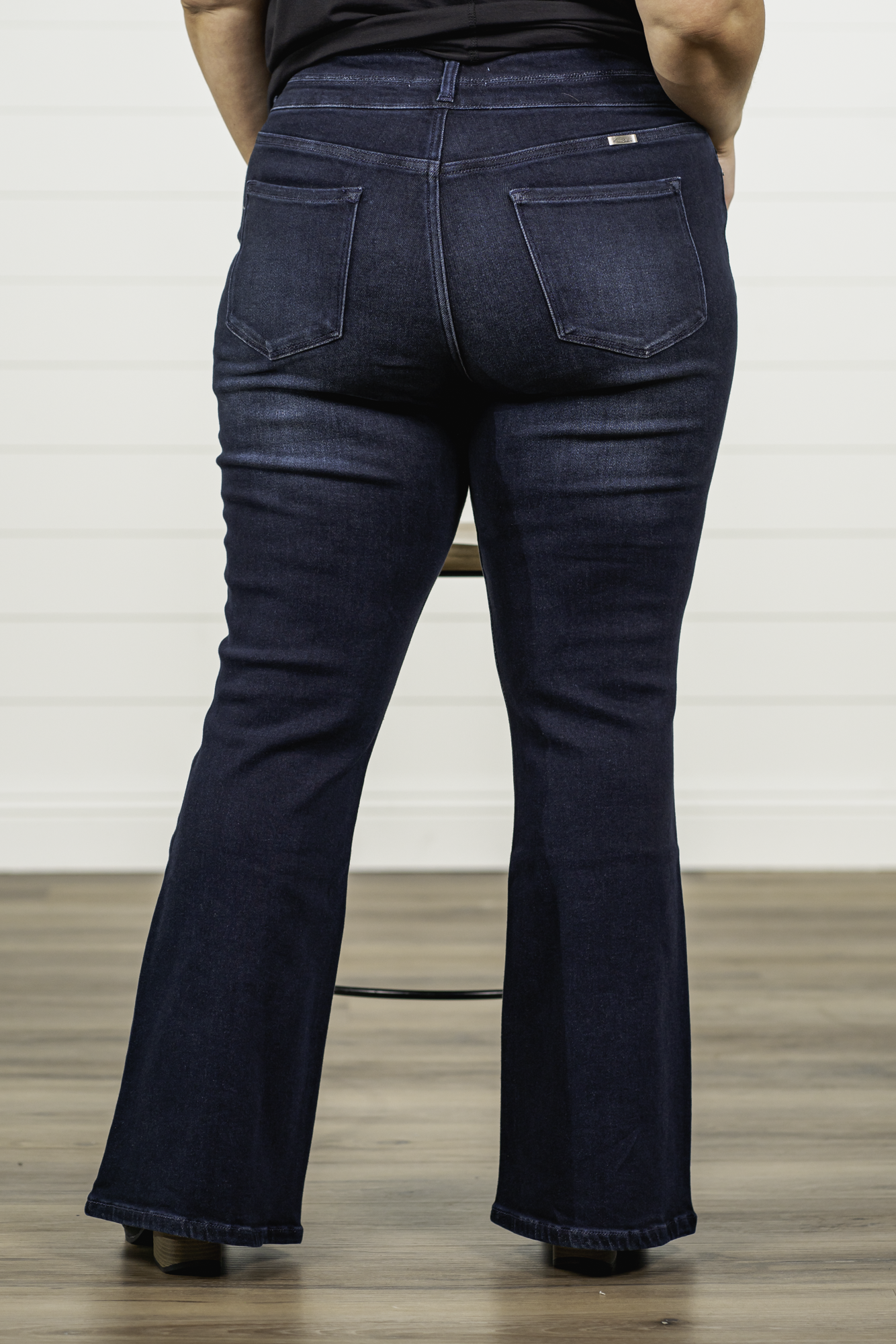 KanCan Jeans   KanCan Plus Size Guide:   XL-16 2XL-18 3XL-20  Color: Dark Wash Cut: Flare Cut, 34" Inseam* Rise: High-Rise, 10.5" Front Rise* Material: 94% Cotton 4% Polyester2% Spandex Detail: Whisker Wash Fly: Zipper Fly with Double Button Closure Style #: KC7123D-P Contact us for any additional measurements or sizing.  *Measured on the smallest size, measurements may vary by size.