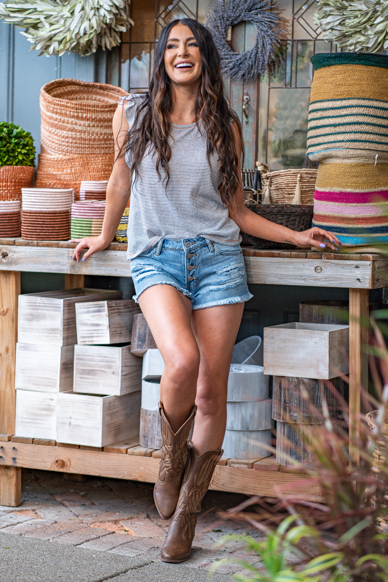 Mid Rise Boyfriend Shorts By Kan Can  Mid Rise waist, 8.5" Front Rise* Shorts, 2.5" Inseam* Light Blue, Distressed Material: 100% Cotton  Stitching: Classic Fly: Exposed Button Fly Style #: KC7817NM Contact us for any additional measurements or sizing.  *Measured on the smallest size, measurements may vary by size. 