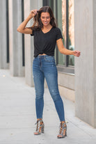 Hidden Jeans Collection: Fall 2020 Color: Medium Blue Cut: Skinny, 28" Inseam  Rise: High-Rise, 10.5" Front Rise 98% Cotton, 2% Spandex Machine Wash Separately In Cold Water Stitching: Classic Fly: Zipper Fly Style #: HD1187H Contact us for any additional measurements or sizing.  Chloe is 5’8" and 130 pounds. She wears a size 3 in jeans, a small top and 8.5 in shoes. She is wearing a 26/3 in these jeans.