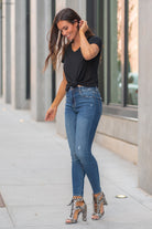 Hidden Jeans Collection: Fall 2020 Color: Medium Blue Cut: Skinny, 28" Inseam  Rise: High-Rise, 10.5" Front Rise 98% Cotton, 2% Spandex Machine Wash Separately In Cold Water Stitching: Classic Fly: Zipper Fly Style #: HD1187H Contact us for any additional measurements or sizing.  Chloe is 5’8" and 130 pounds. She wears a size 3 in jeans, a small top and 8.5 in shoes. She is wearing a 26/3 in these jeans.